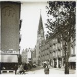 Tweede van der Helststraat vanaf Van der Helstplein met de toren van de NH Oranjekerk ca 1930
